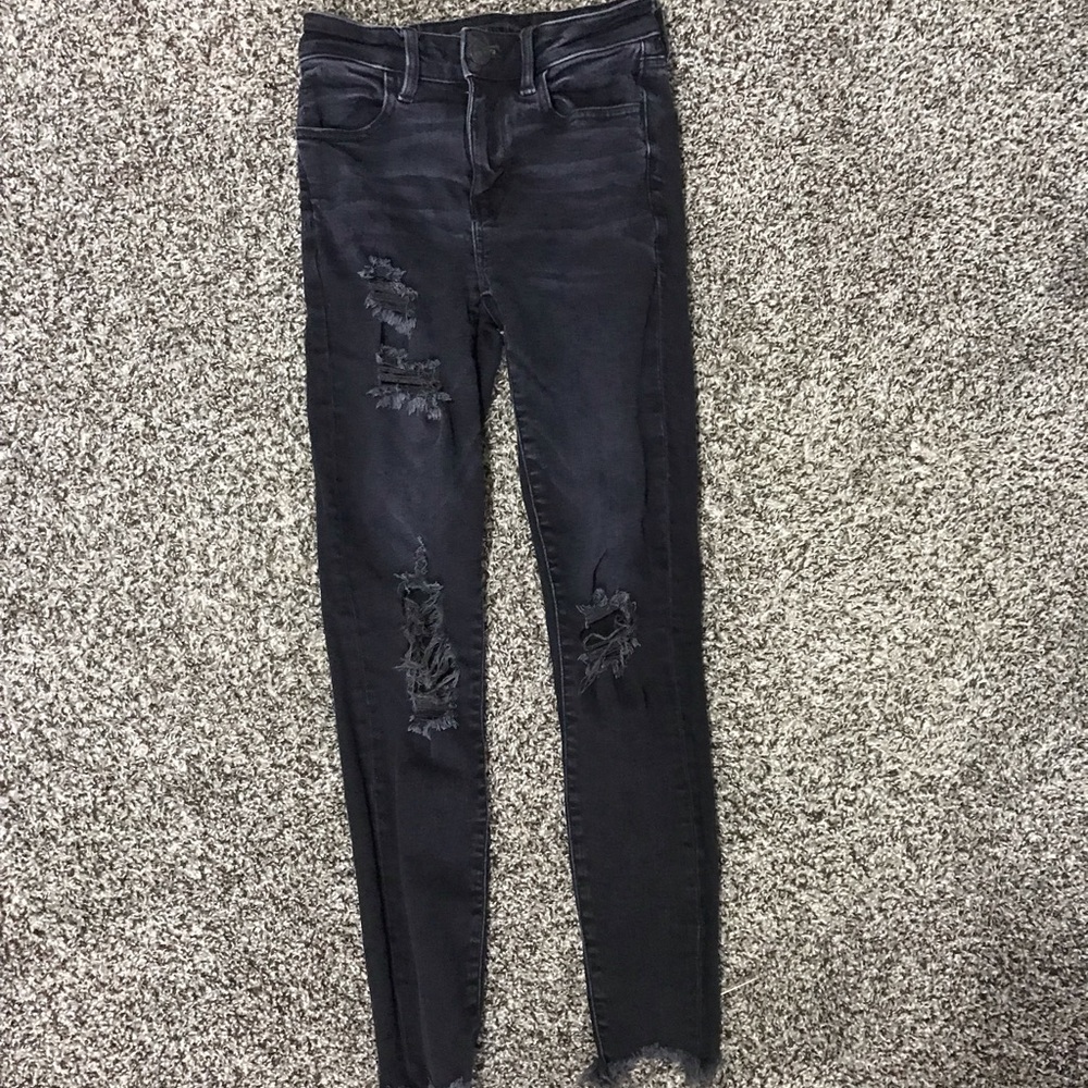 black ripped jeans